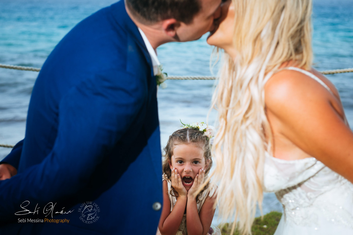 Bride and groom kissing Hyatt Ziva Cancun - Sebi Messina Photography