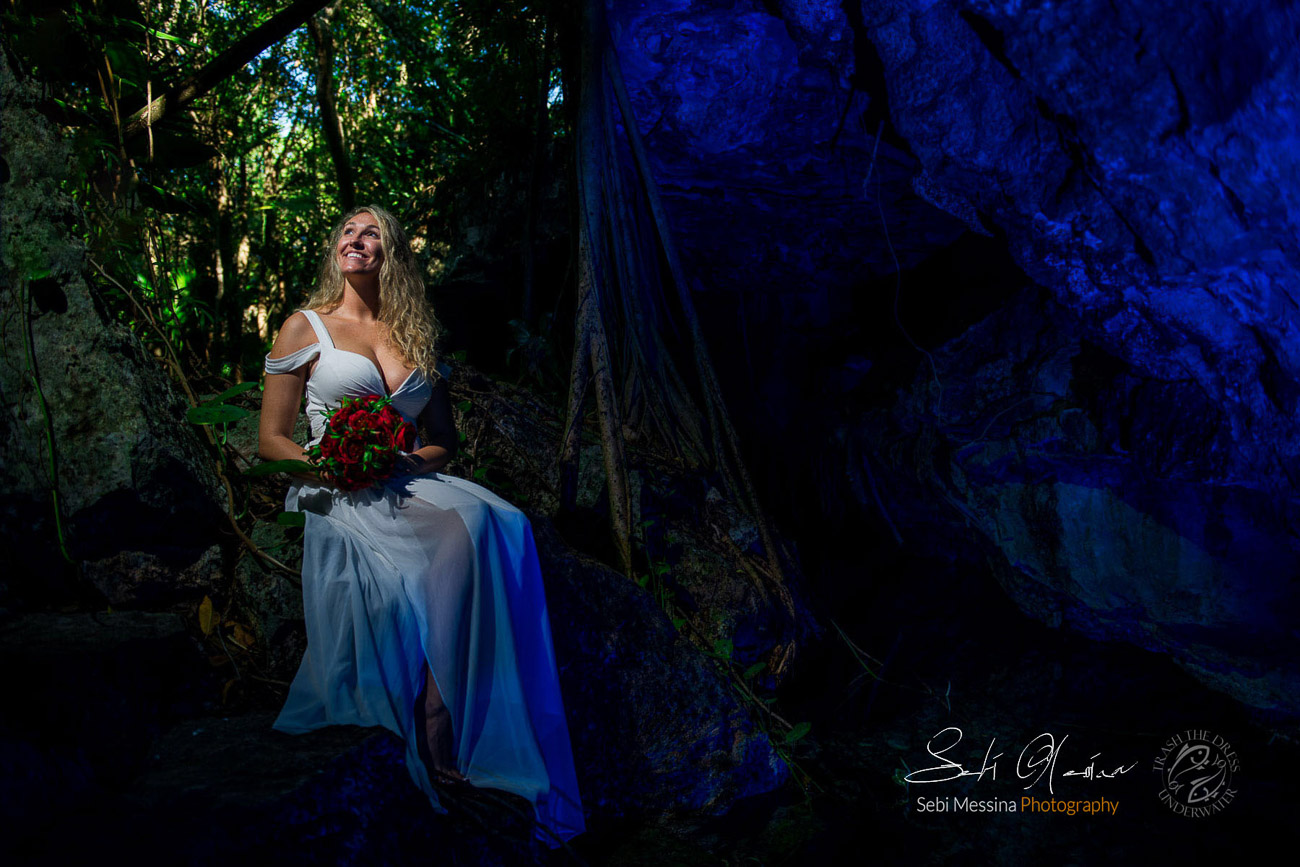 Bride modelling in a cenote in Mexico